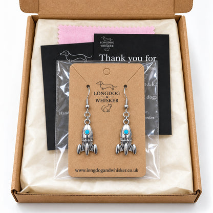 Silver rocket earrings on their product card in gift-ready Longdog & Whisker packaging