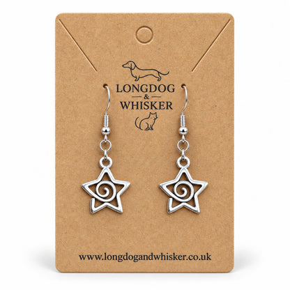 Silver-tone spiral star drop earrings on a Longdog & Whisker kraft card
