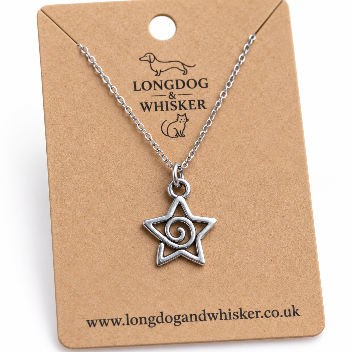 Close-up of the spiral star pendant's open outline, curling centre and chain connector