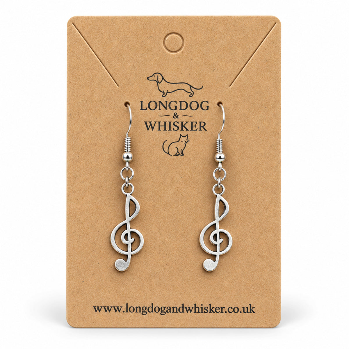 Silver-tone treble clef music note drop earrings on a Longdog & Whisker kraft card