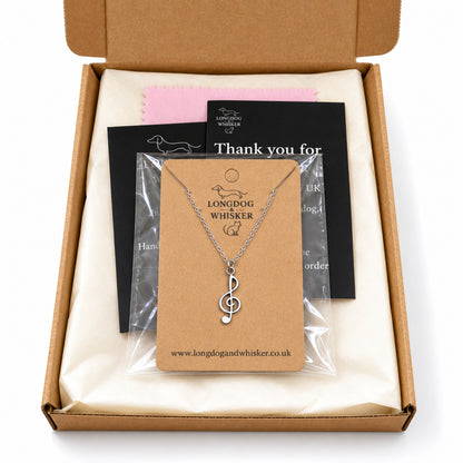 Treble clef silver-tone chain necklace in Longdog & Whisker kraft packaging