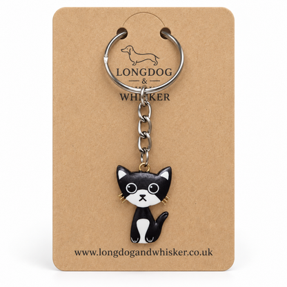 Close-up of Simon cat keyring and silver-tone chain