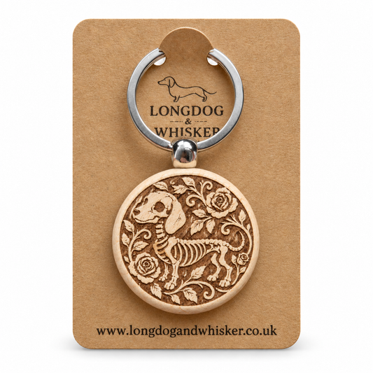 Skeleton Sausage Dog wooden keyring on its Longdog & Whisker card