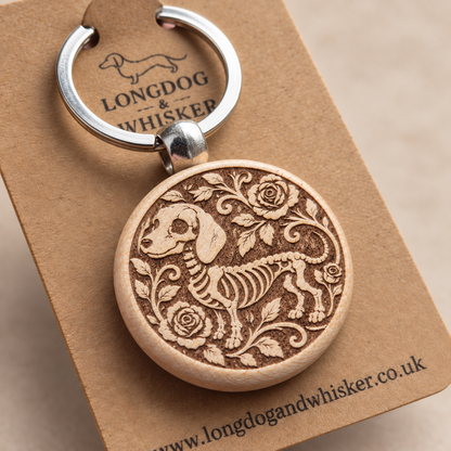 Close-up of the Skeleton Sausage Dog wooden keyring engraving