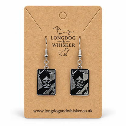 Skull Ace of Spades playing card drop earrings on a Longdog & Whisker kraft card