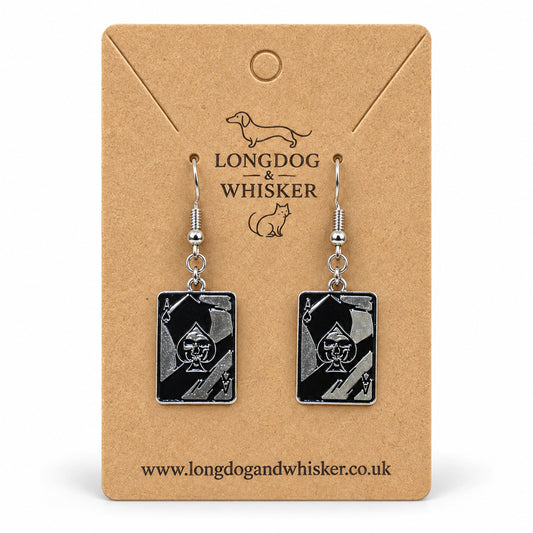 Skull Ace of Spades playing card drop earrings on a Longdog & Whisker kraft card