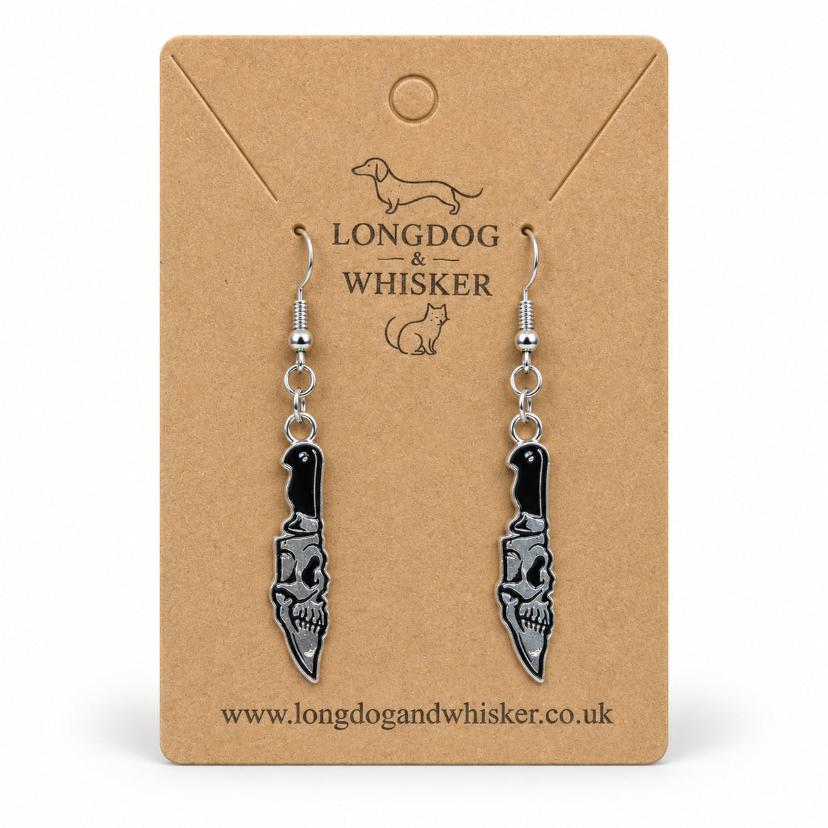 Skull Blade Knife Drop Earrings displayed on a Longdog & Whisker card