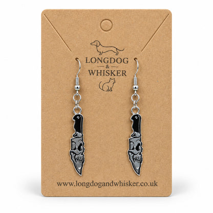 Skull Blade Knife Drop Earrings displayed on a Longdog & Whisker card