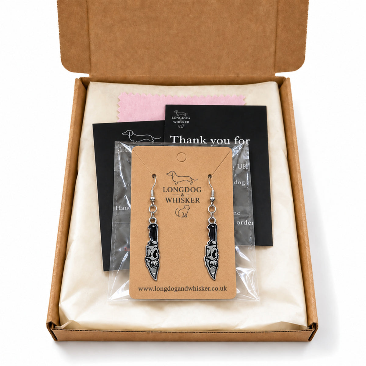 Skull Blade Knife Drop Earrings presented in Longdog & Whisker gift packaging