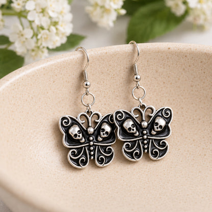 Skull Butterfly Earrings displayed in a lifestyle product photo