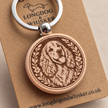 Close-up of the printed Springer Spaniel wooden keyring and silver-tone hardware