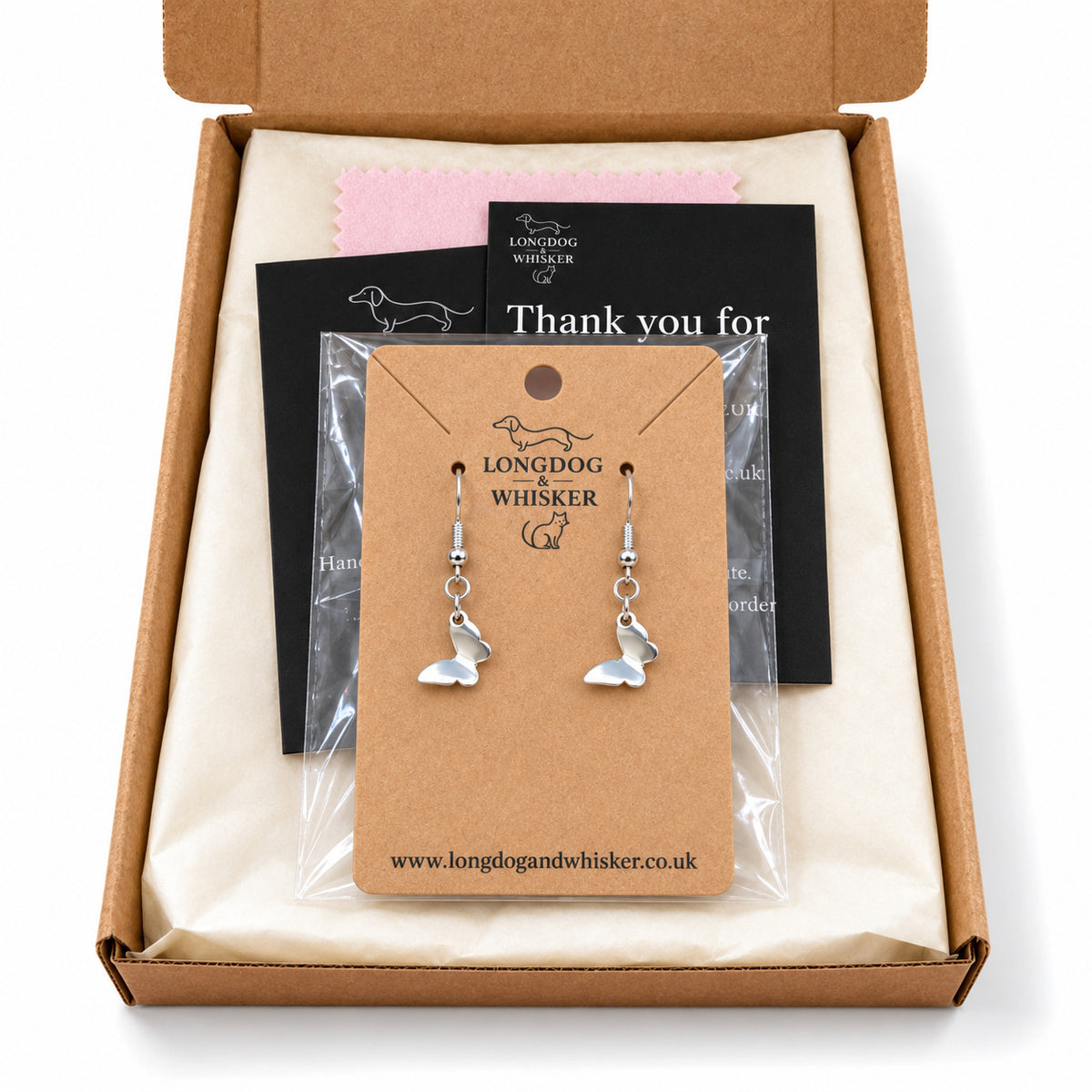 Stainless steel butterfly earrings in Longdog & Whisker kraft packaging