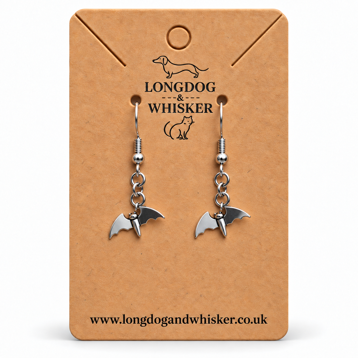 Stainless steel flying bat drop earrings on a Longdog and Whisker card