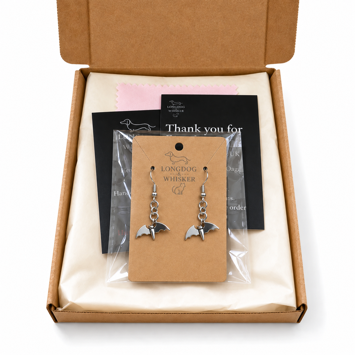 Stainless steel flying bat earrings in Longdog and Whisker gift packaging