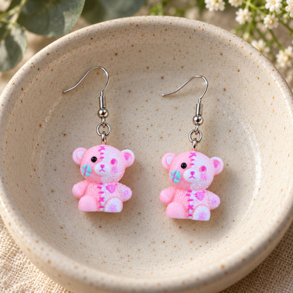 Pink Stitched Zombie Bear Earrings in ceramic bowl lifestyle scene