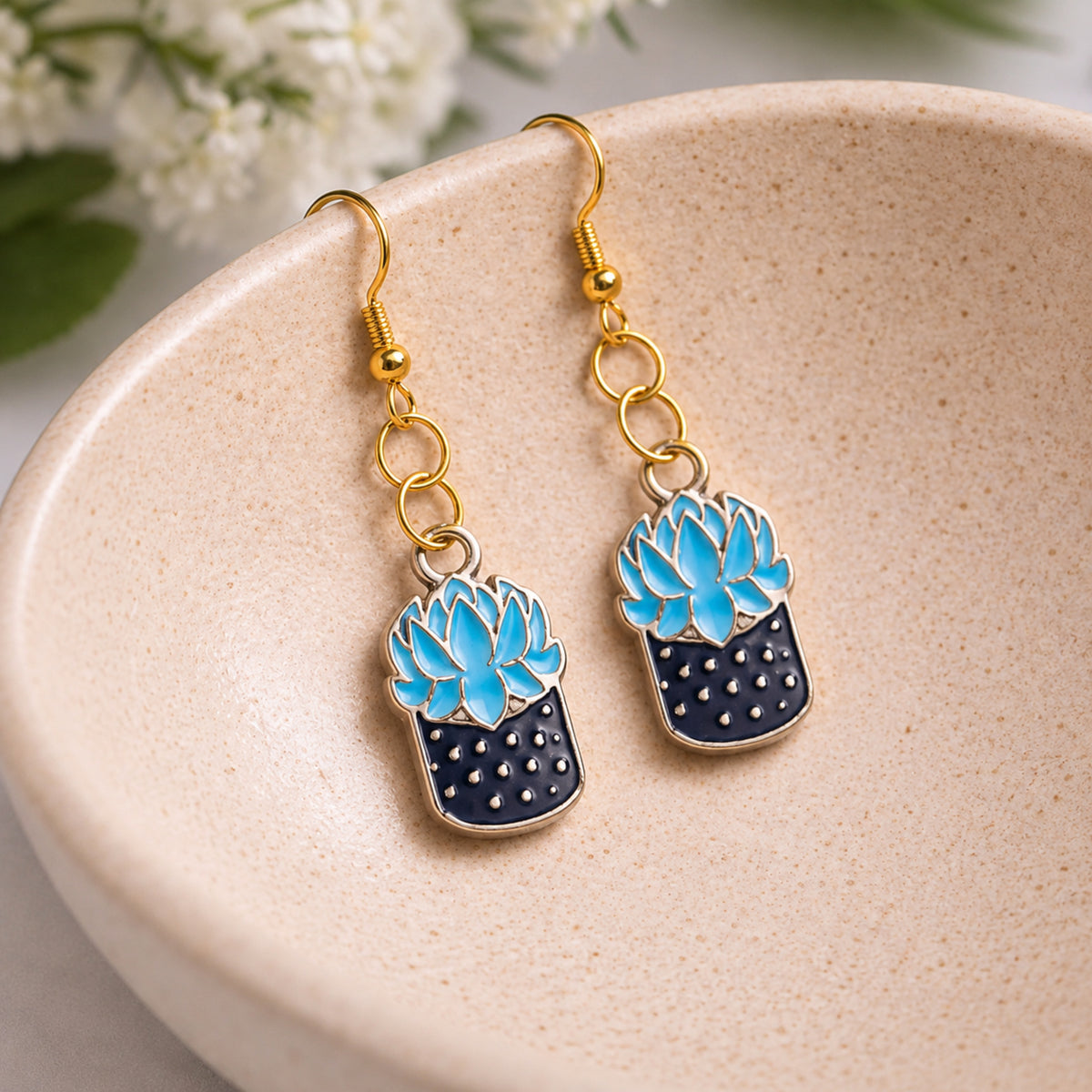 Succulent Blue Earrings displayed in a lifestyle product photo