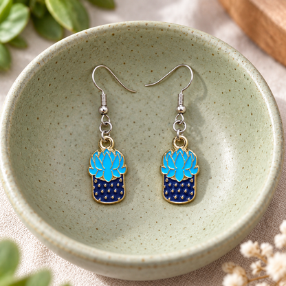 Succulent Blue Earrings hanging from bowl with silver hooks