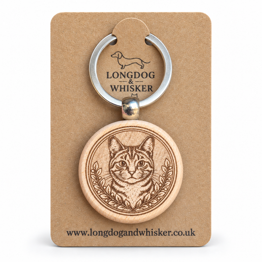 Tabby cat wooden keyring with striped portrait and leafy frame on Longdog & Whisker card
