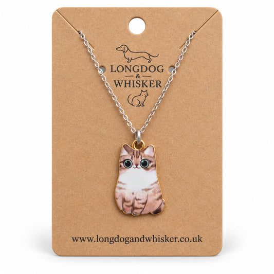 Tabby chonky cat necklace on a silver chain, displayed on a Longdog & Whisker kraft card