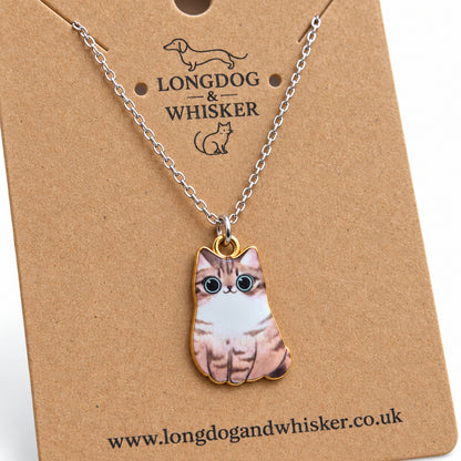 Close-up of the Tabby Chonky Cat Necklace showing its striped markings and gold-tone edging