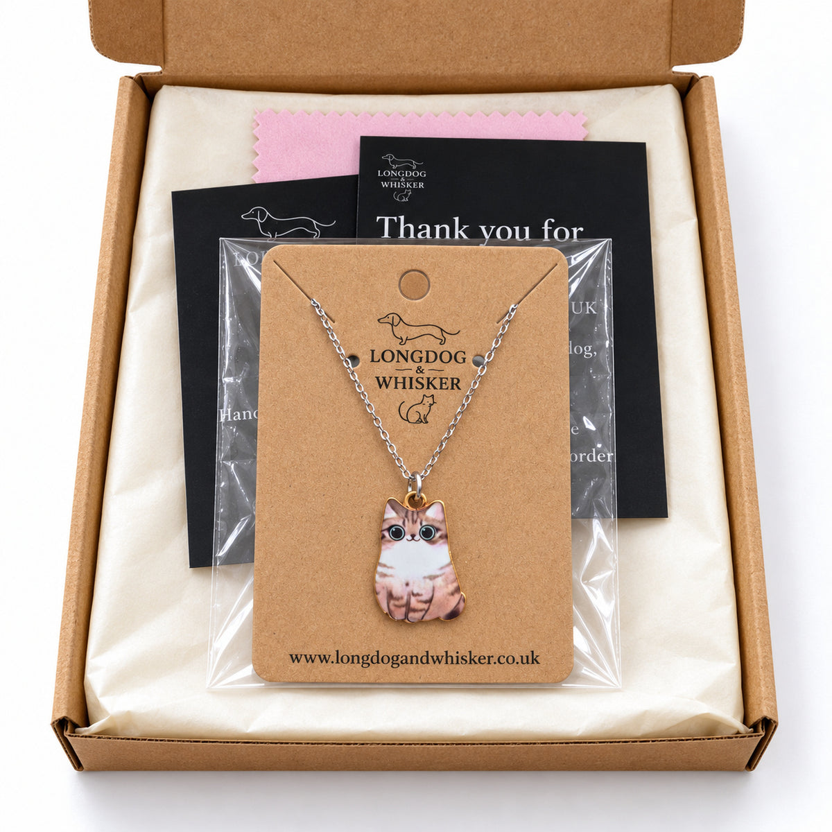 Tabby chonky cat necklace on its card in Longdog & Whisker gift-ready packaging