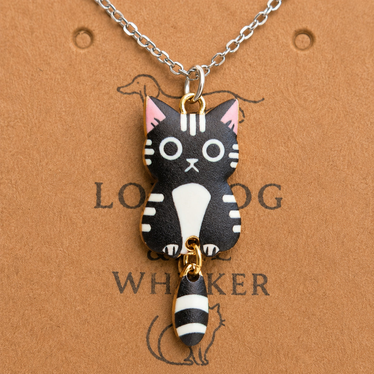 Close-up detail of Tick Tock Cat Necklace - Black & White