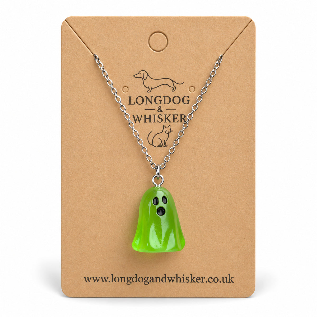 Translucent green ghost necklace with silver chain on a Longdog & Whisker kraft card.