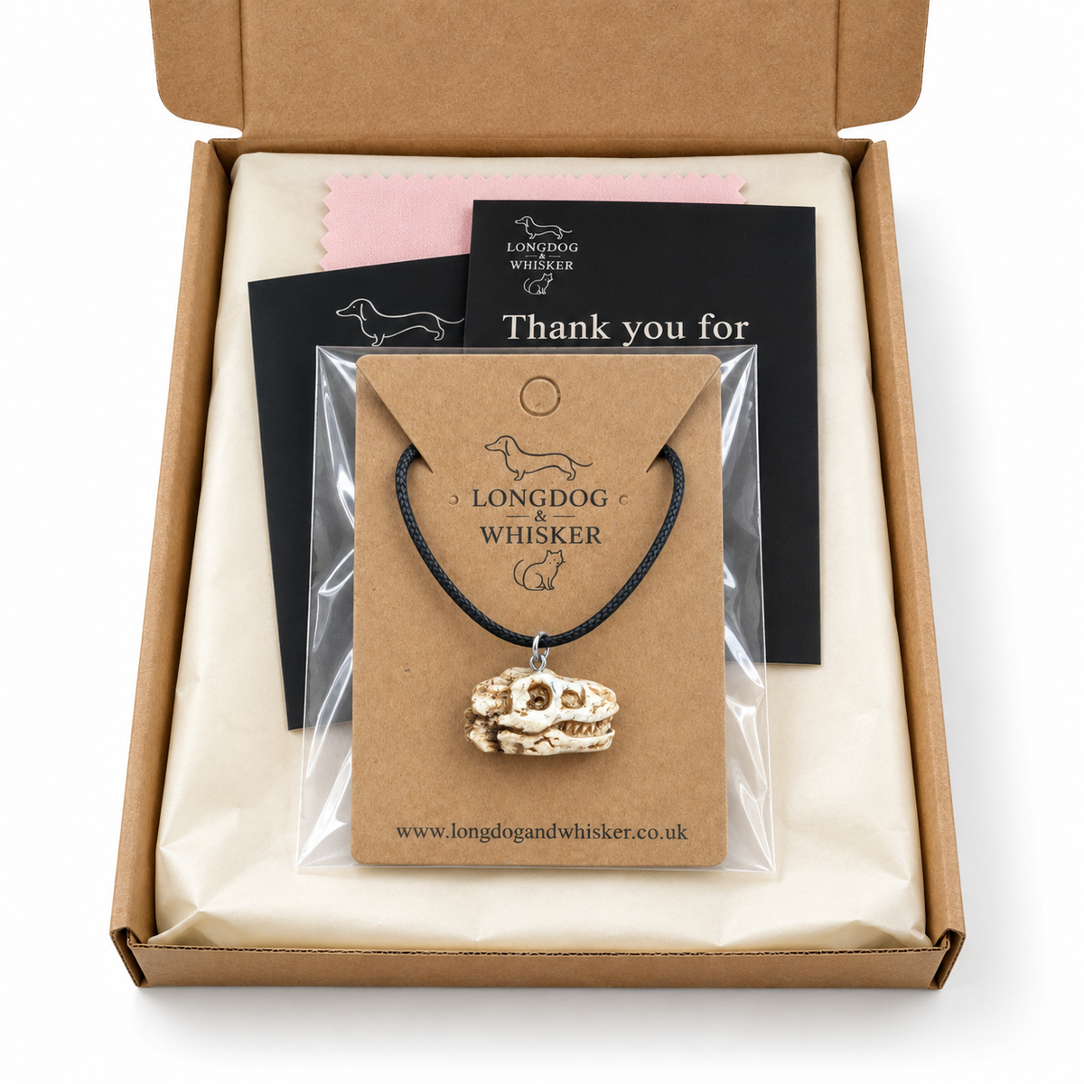 T-Rex dinosaur skull necklace in Longdog & Whisker gift packaging