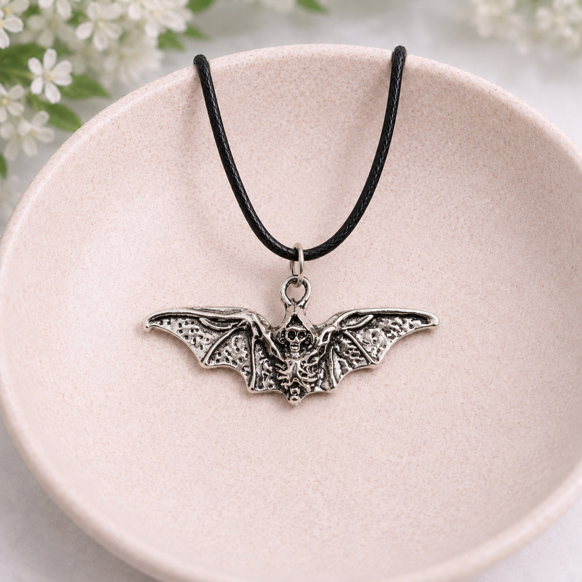 Vampire Bat Necklace displayed in a lifestyle product photo