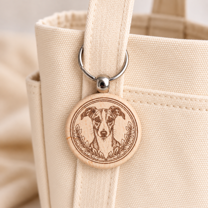 Whippet wooden keyring attached to a cream canvas tote handle