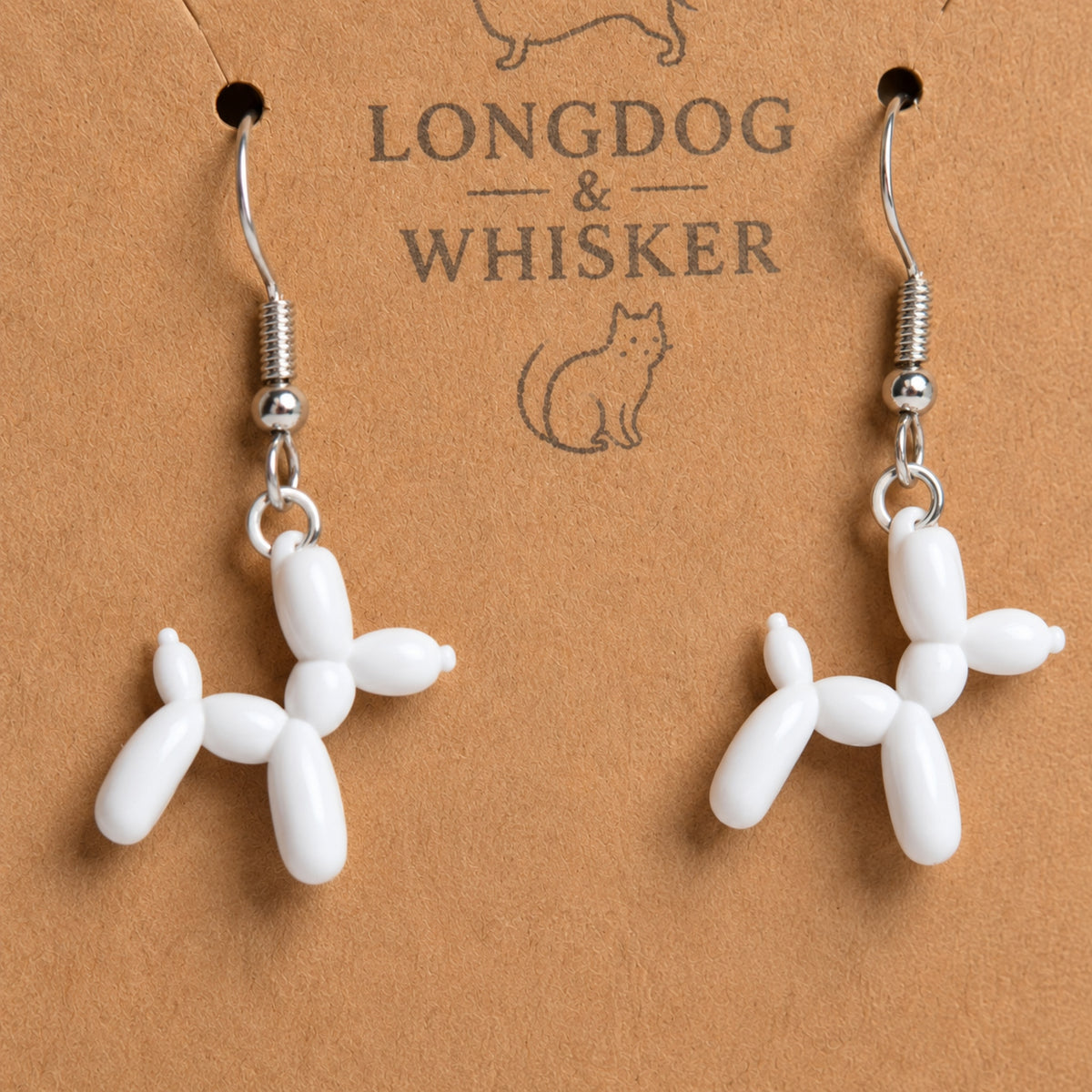 Close up detail of White Balloon Dog Earrings