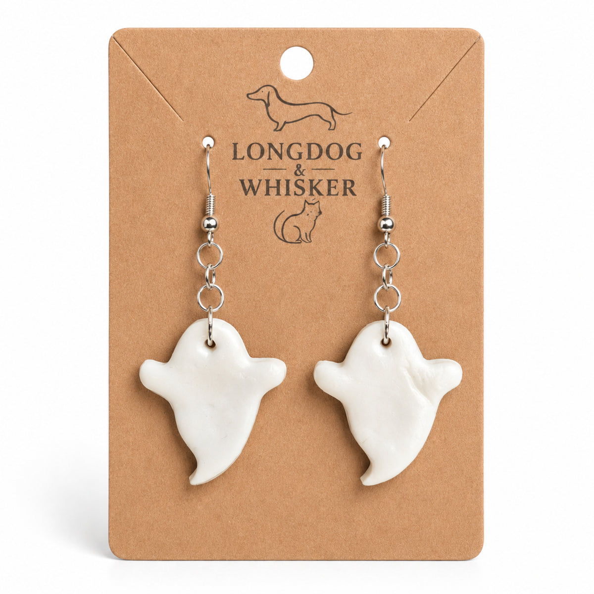 White ghost earrings on Longdog & Whisker display card
