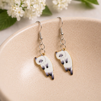 Scruffles Cat Earrings - White displayed in a lifestyle product photo