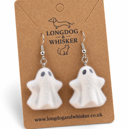 Close-up of Woooo Ghost Earrings and silver hooks