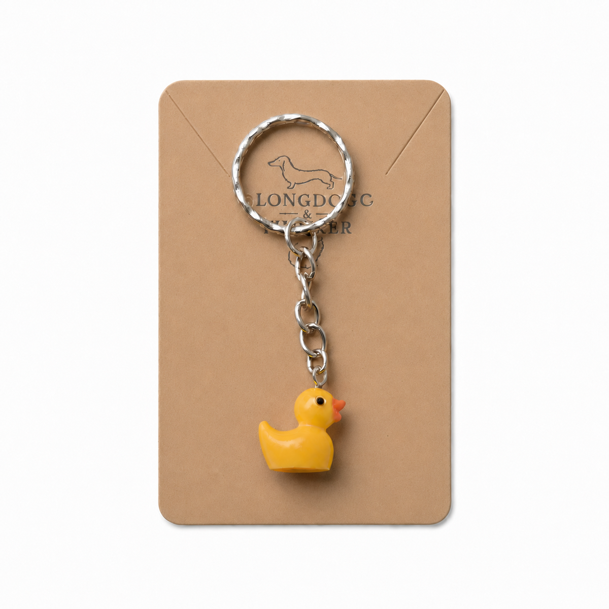 Yellow duck keyring and bag charm with silver-tone ring and chain on a Longdog & Whisker display card
