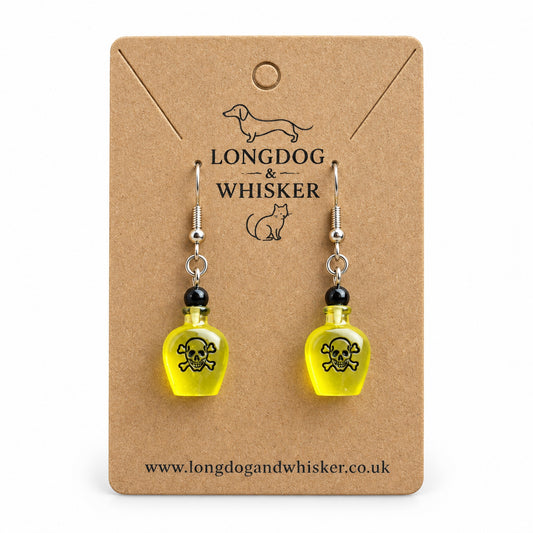 Yellow Poison Bottle Drop Earrings product photo on Longdog & Whisker kraft card