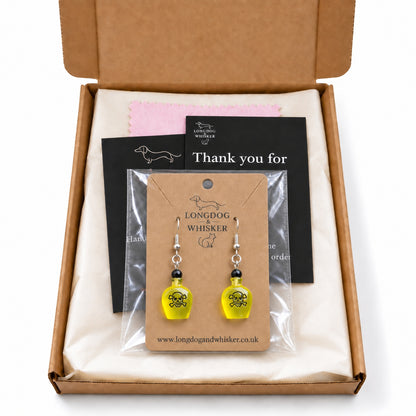 Yellow Poison Bottle Drop Earrings with Longdog & Whisker packaging